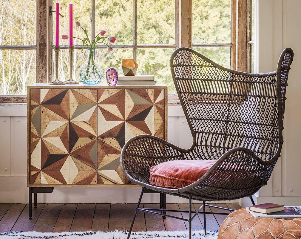 the ashton sidetable from graham and green features intricate mango wood detail. photography by mel yates