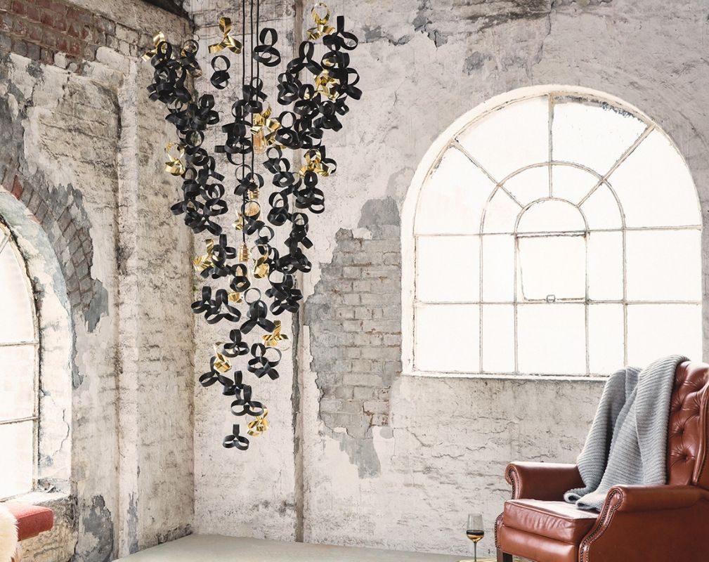 Tom Raffield Noctis Giant Flock Chandelier in an industrial setting