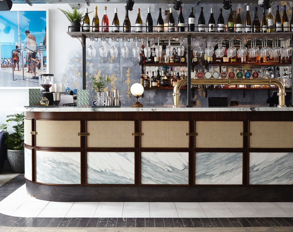 The industrial chic bar at Scarlett Green Soho in London designed by Run For The Hills