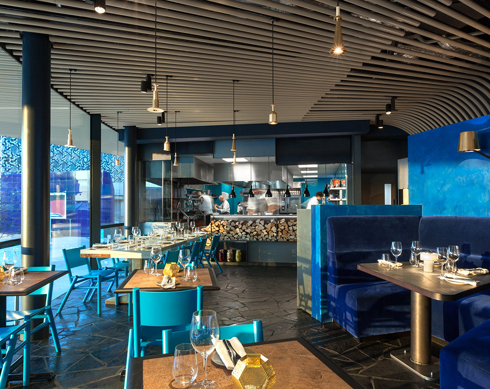 teal and blue features in the craft london restaurant interior by tom dixon