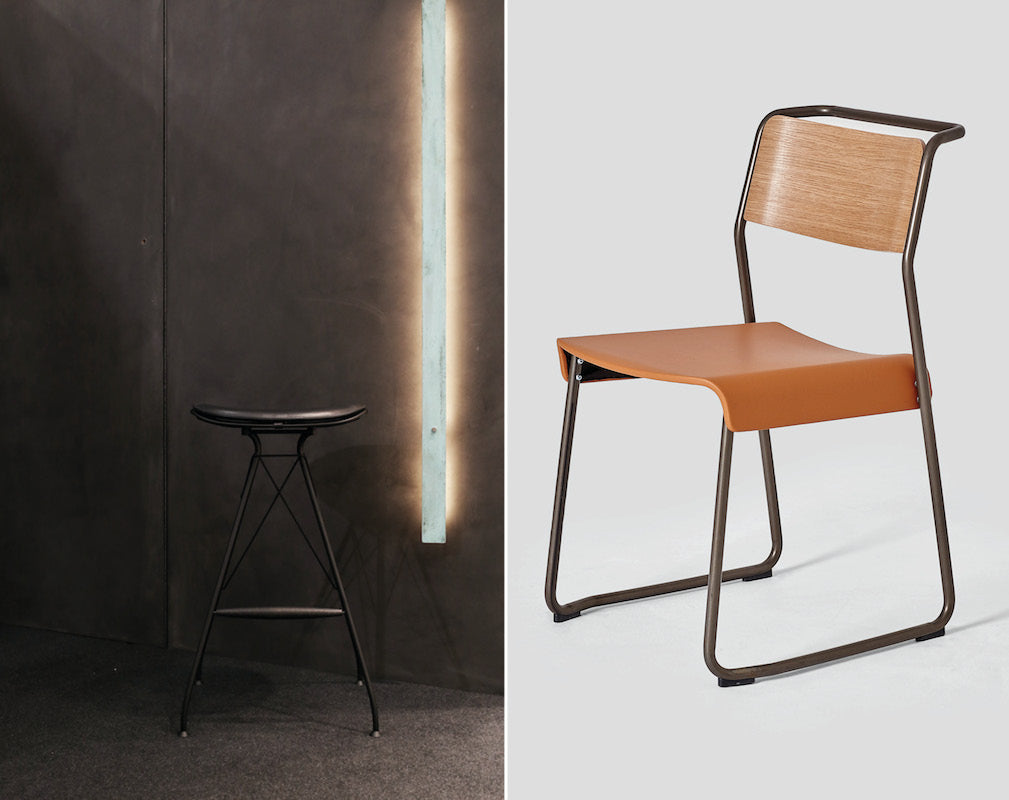 A pair of industrial stools with leather.