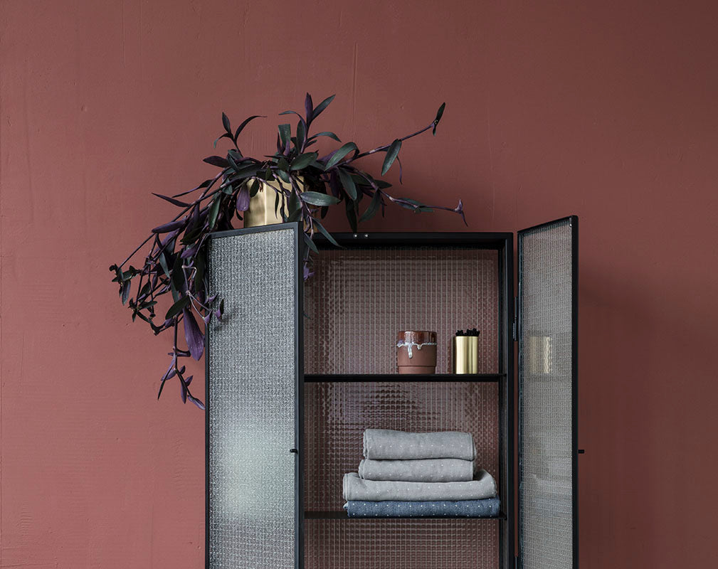 Glass and metal industrial style bathroom cabinet from Ferm Living.