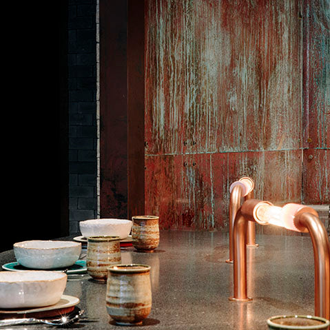 Rhoda Hong Kong restaurant interior by Joyce Wang detail patinated metal finish with copper fixtures