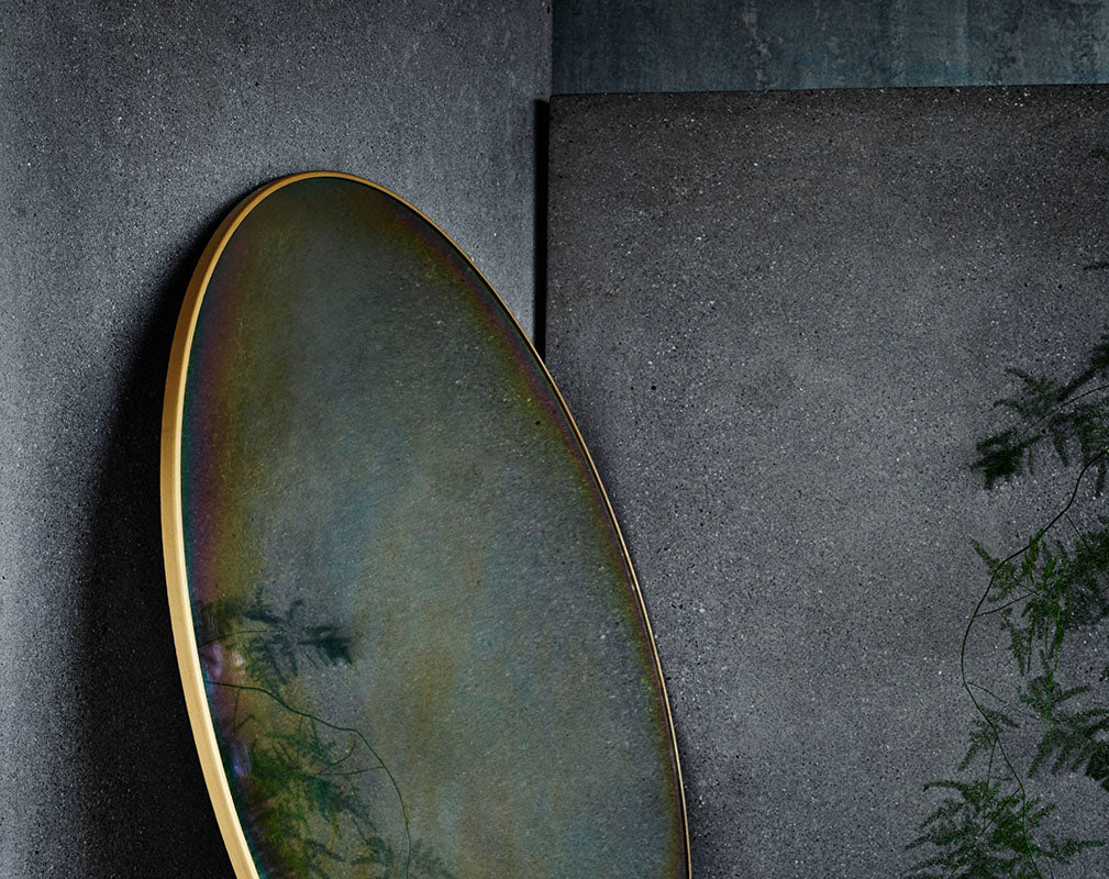 Atelier iridescent mirror by Fritz Hansen via Skandium.