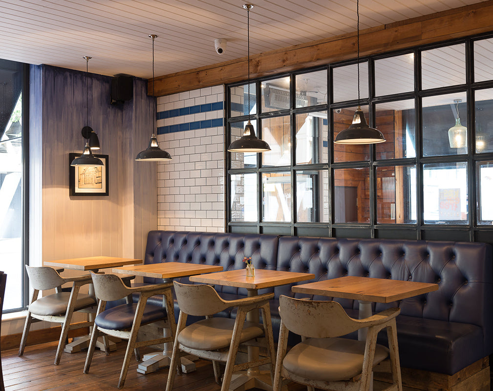 industrial restaurant interior scheme with factory style pendants from artifact lighting