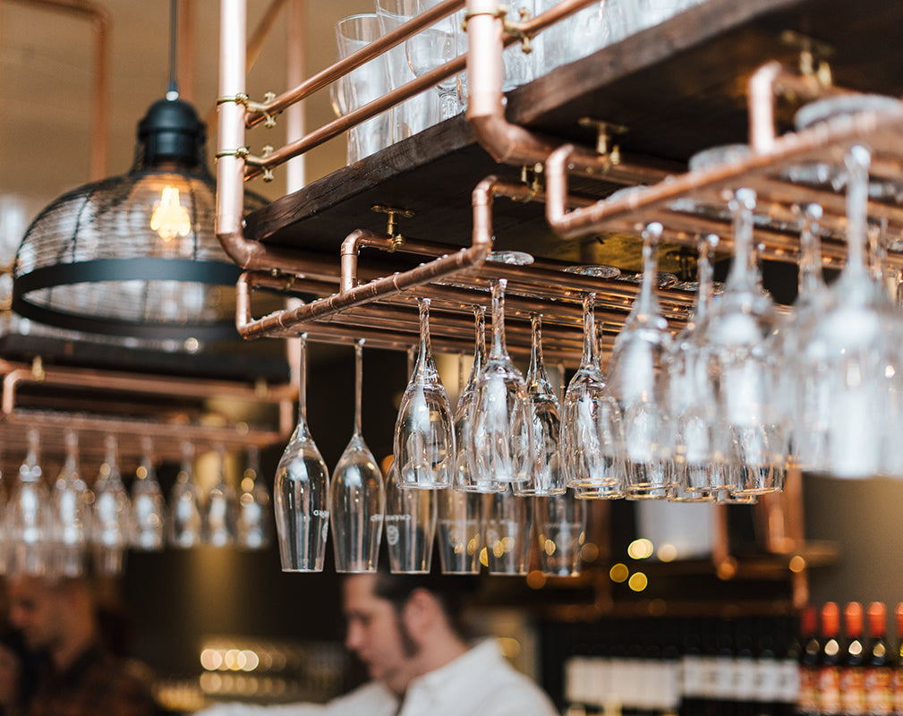 new craven hall leeds wedding venue in a converted industrial building with copper pipe shelving