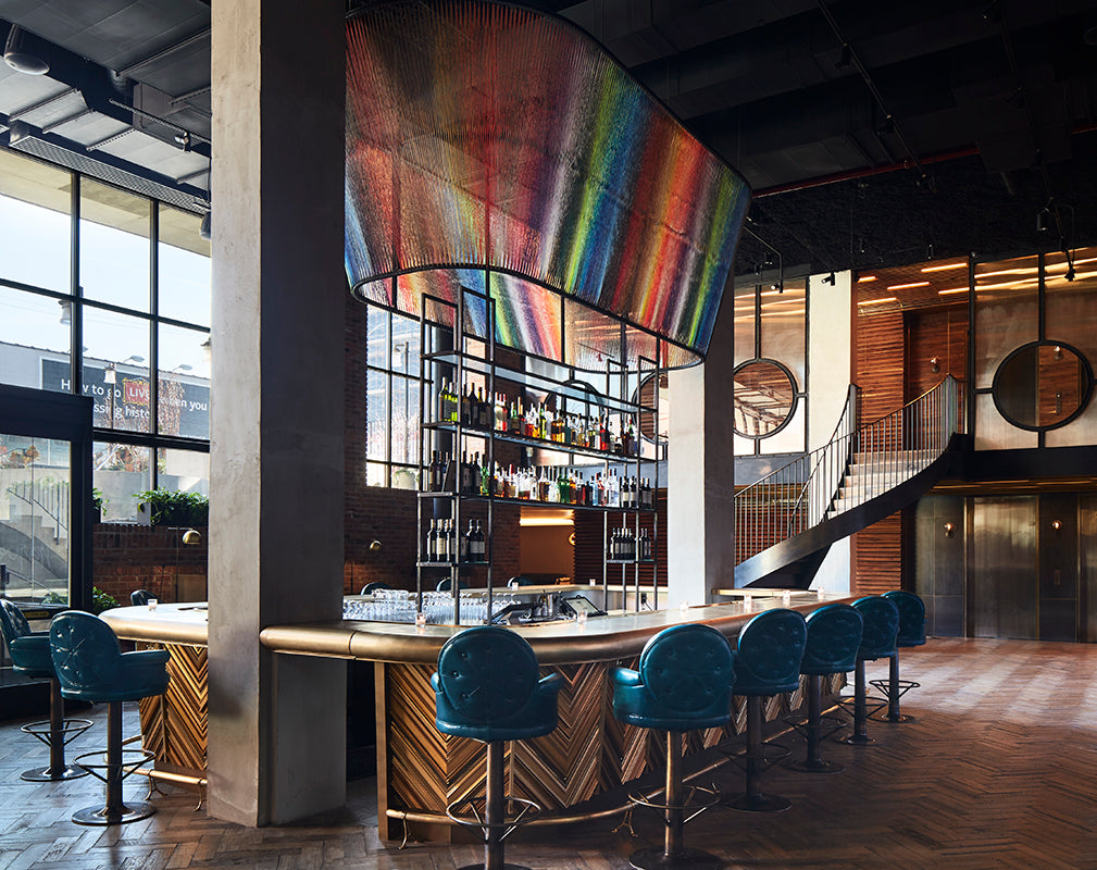 hotel bar in the williamsburg hotel booklyn features installation by local street artist