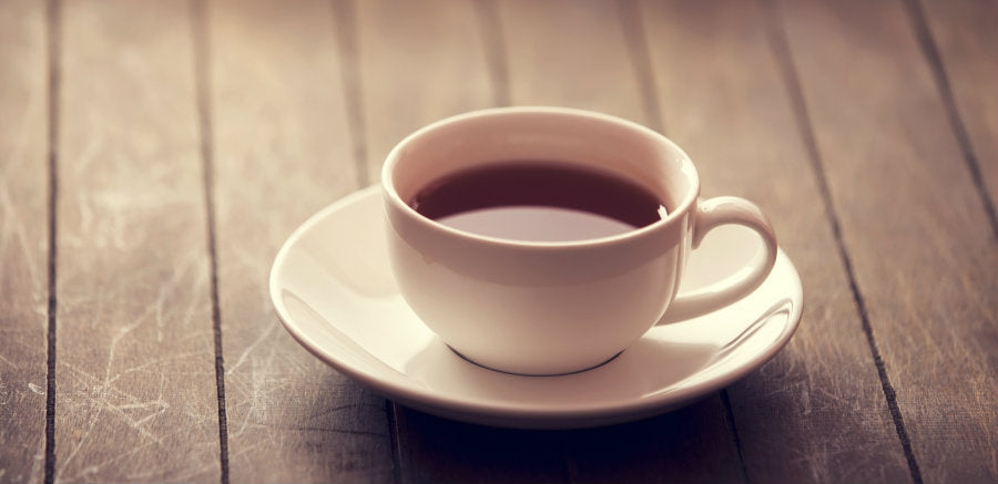 Tea cup filled with red rooibos tea