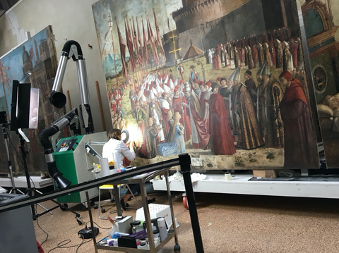 Restorer at work on this paining in the St Ursula Cycle, 4/27/2018 