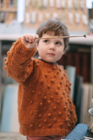 A boy replacing an old makeup brush that hasn't retained its shape