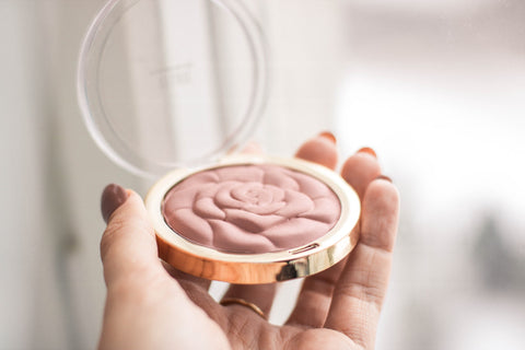 Blush product opened and ready for application to the face