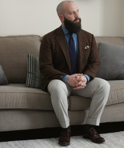 51 Label Style Talk - Dark Brown Donegal Sports Coat with Light Denim Shirt and navy self-stripe tie paired with light brown flannel trousers and dark brown double monk strap shoes