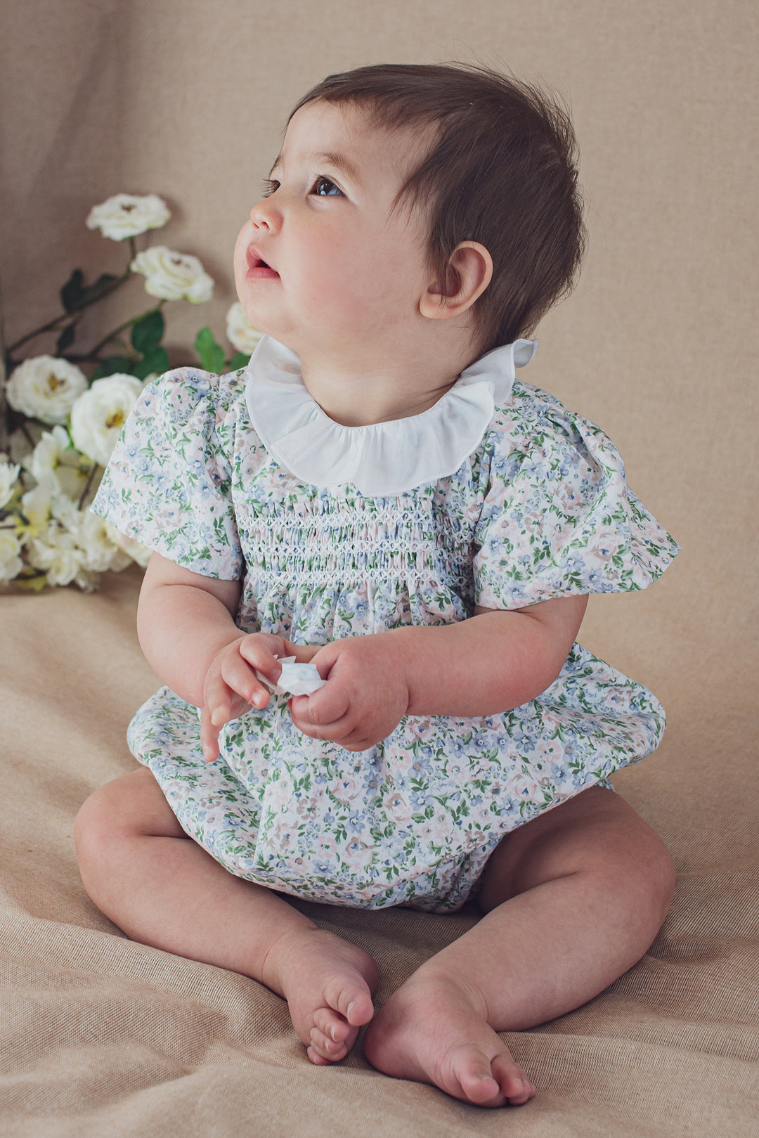 Coccodè "Kalia" Blue Floral Smocked Romper | iphoneandroidapplications