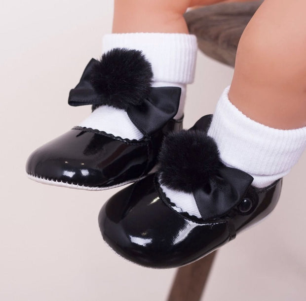 black pom pom shoes