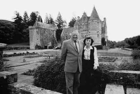 Duntreath Castle 1995, Sir Archibald and Lady Edmonstone in front of their ancestral home. (Photographed courtesy of the Oban Times Ltd.)