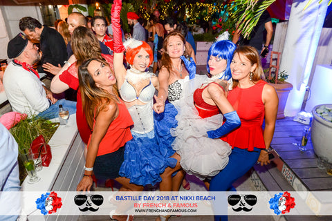 Guests and performers dancing at the Bastille Day event organized by French & Famous