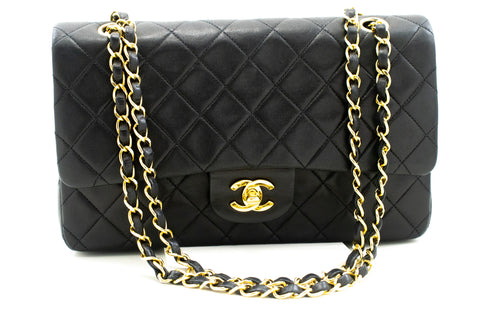 CHANEL Black jersey bag, half-moon model with parall…