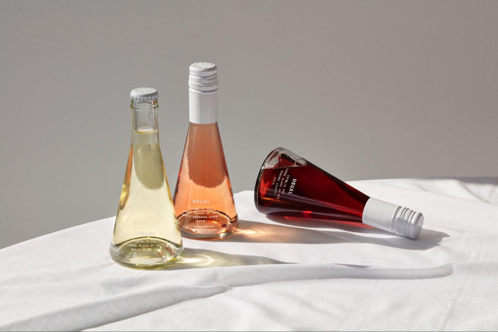 individual bottles of Brut, Rosé, and Red wine from Usual Wines