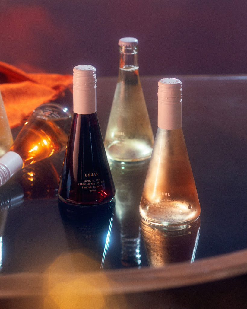 sugar in wine: four Usual Wines bottles on a table