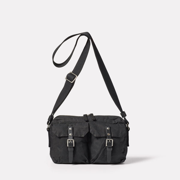 Franco Waxed Cotton Crossbody Bag in Black | Ally Capellino
