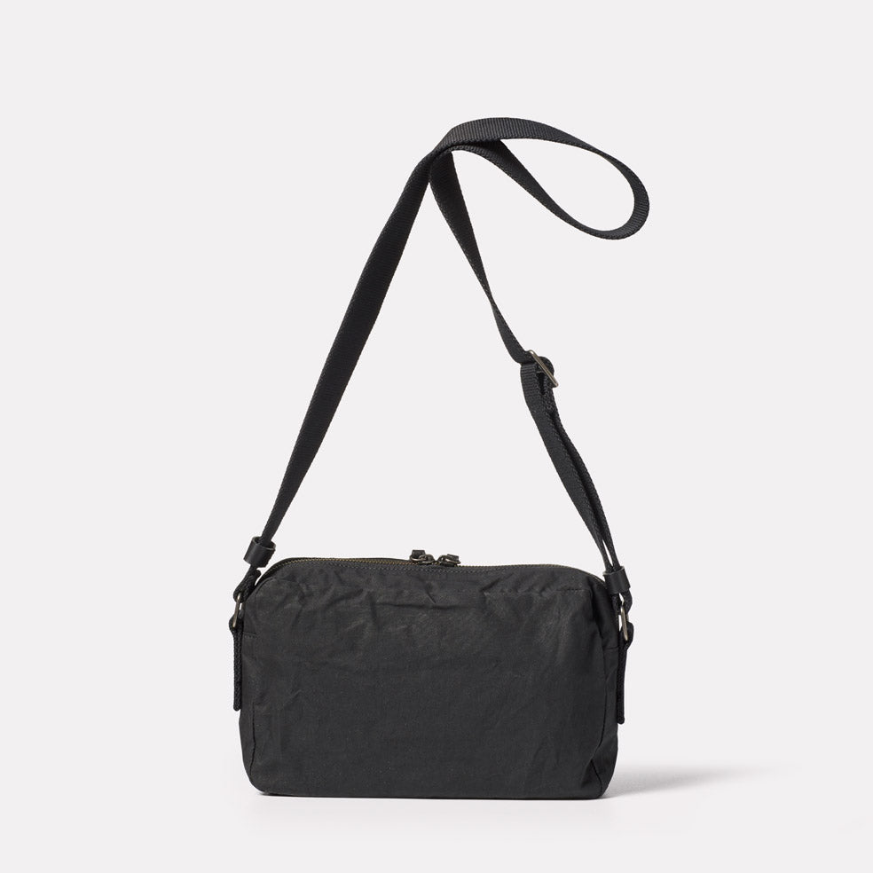 Franco Waxed Cotton Crossbody Bag in Black | Ally Capellino