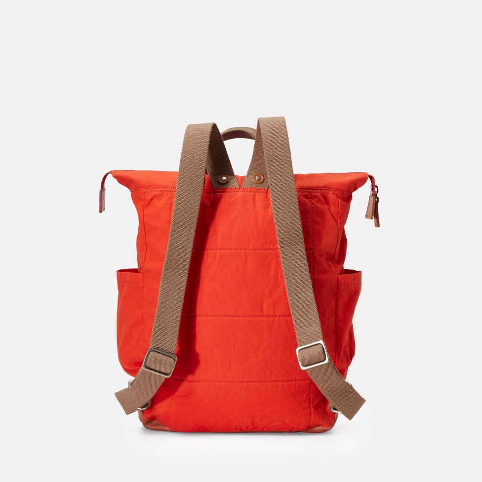 NEW IN: Fin Waxed Cotton Rucksack in Flame Orange | Ally Capellino