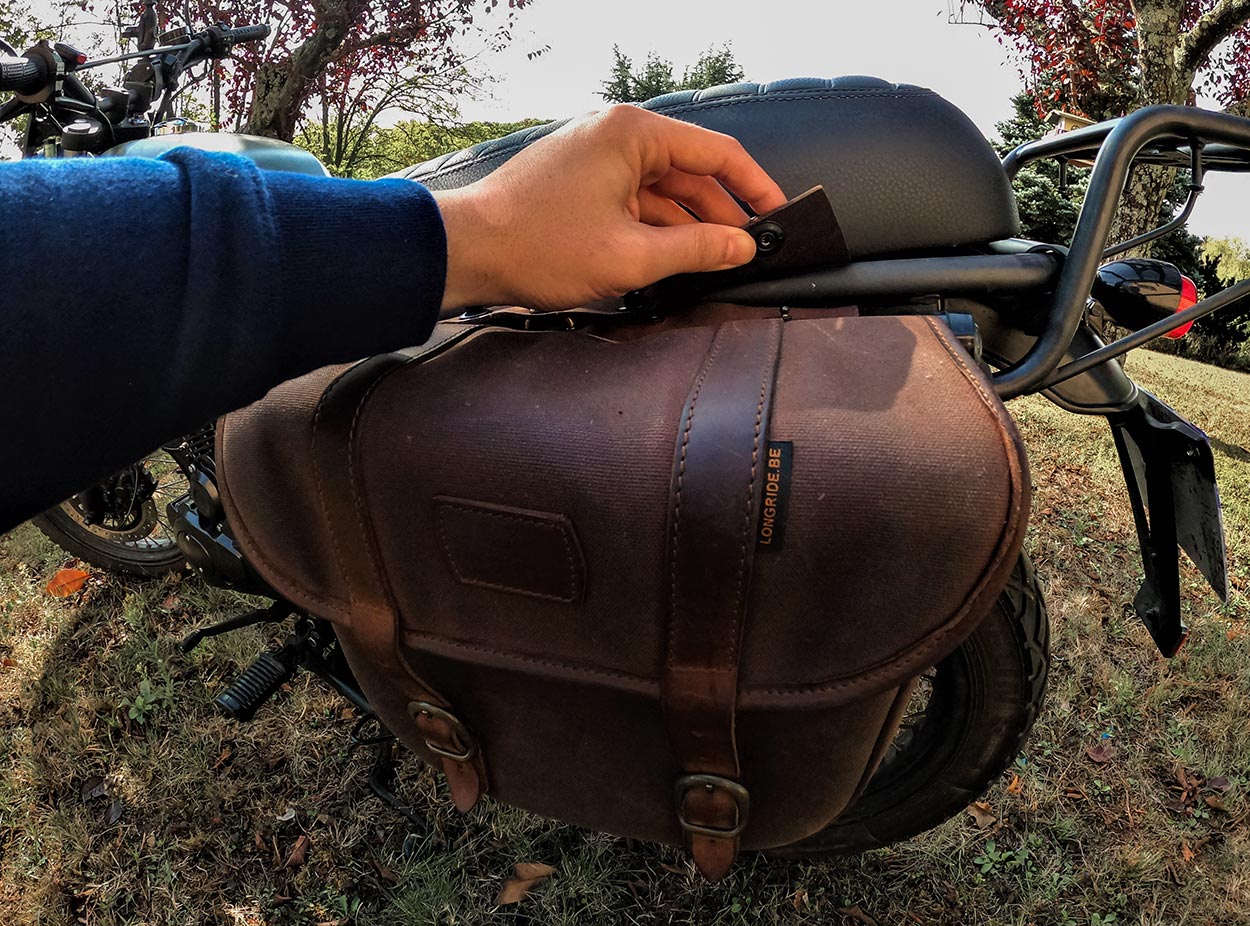 Mounting a retro saddlebag on a scrambler motorcycle.