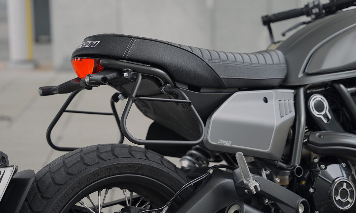 Saddlebag frame for Ducati Scrambler moto.