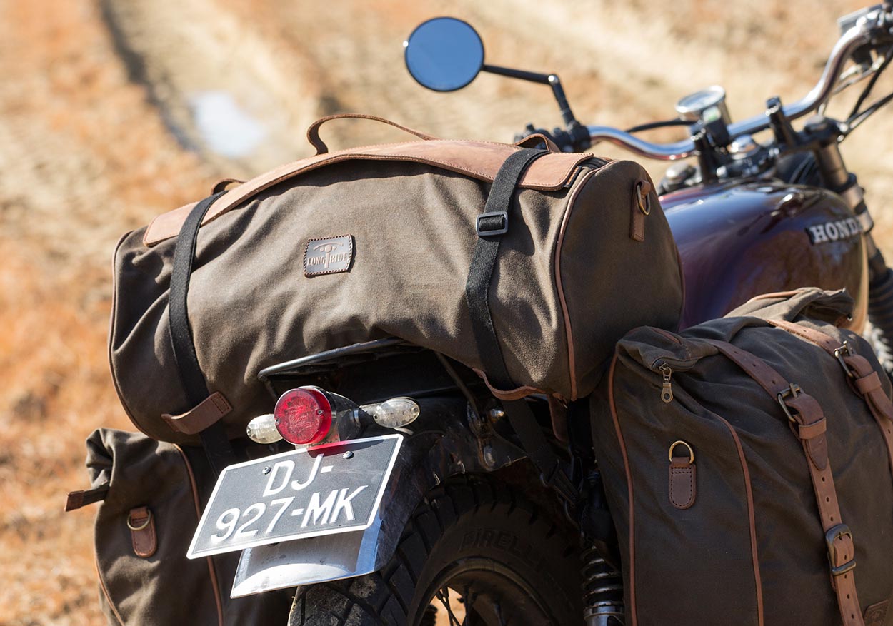 Tail duffle bag on vintage motorcycle.