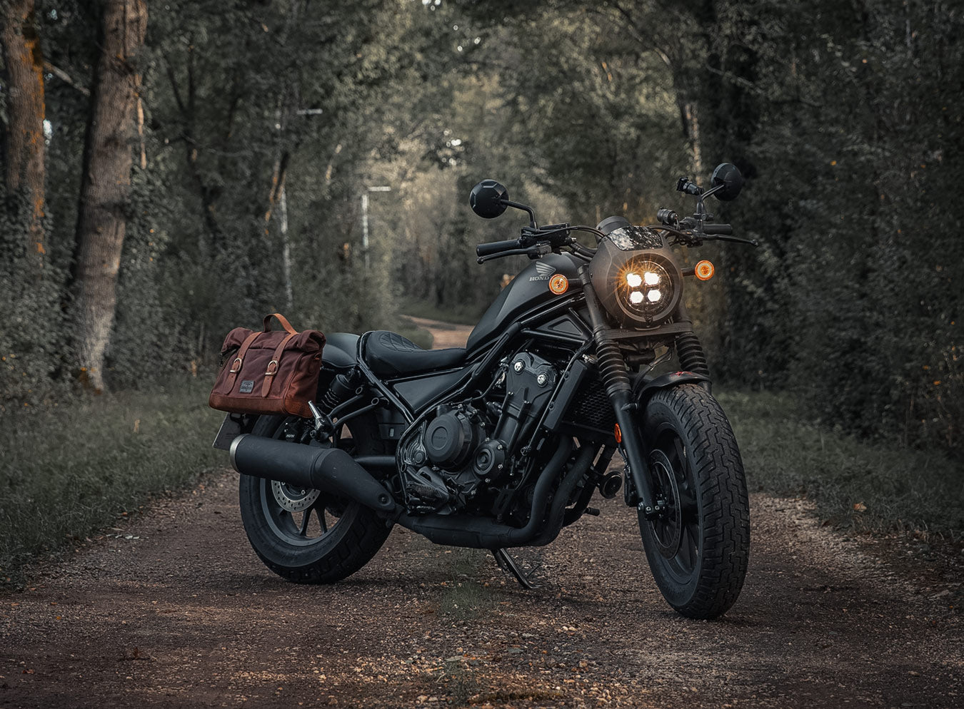 Vintage style brown saddlebag for Honda Rebel moto.