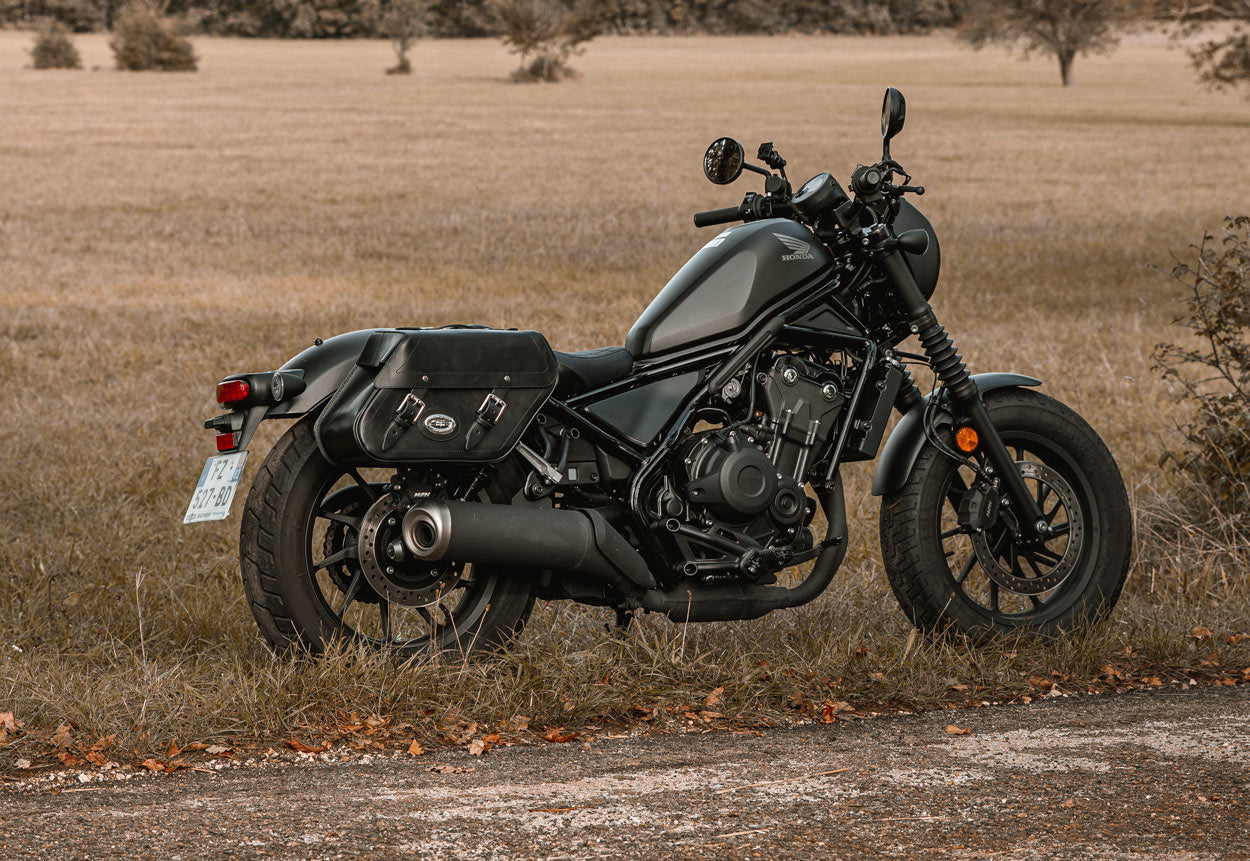 Black leather panniers for Honda Rebel.