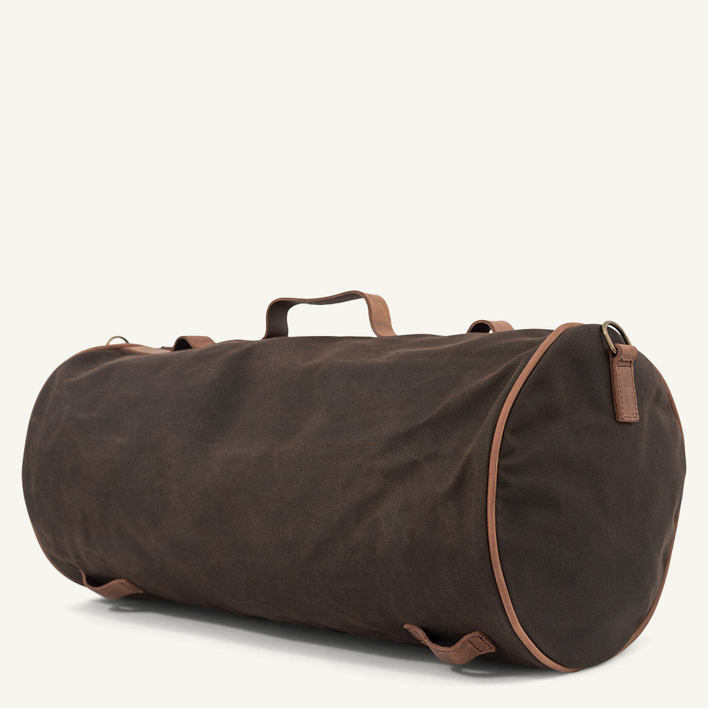 https://cdn.shopify.com/s/files/1/2334/3163/products/large-tail-bag-duffle-moto-kaki_2000x.jpg?v=1629794987