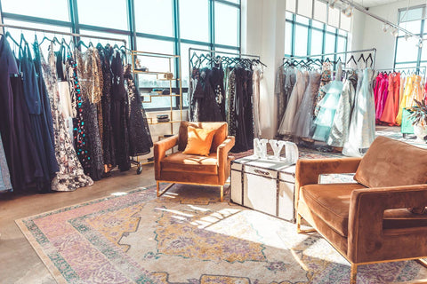 Interior shot of our store with racks of dresses