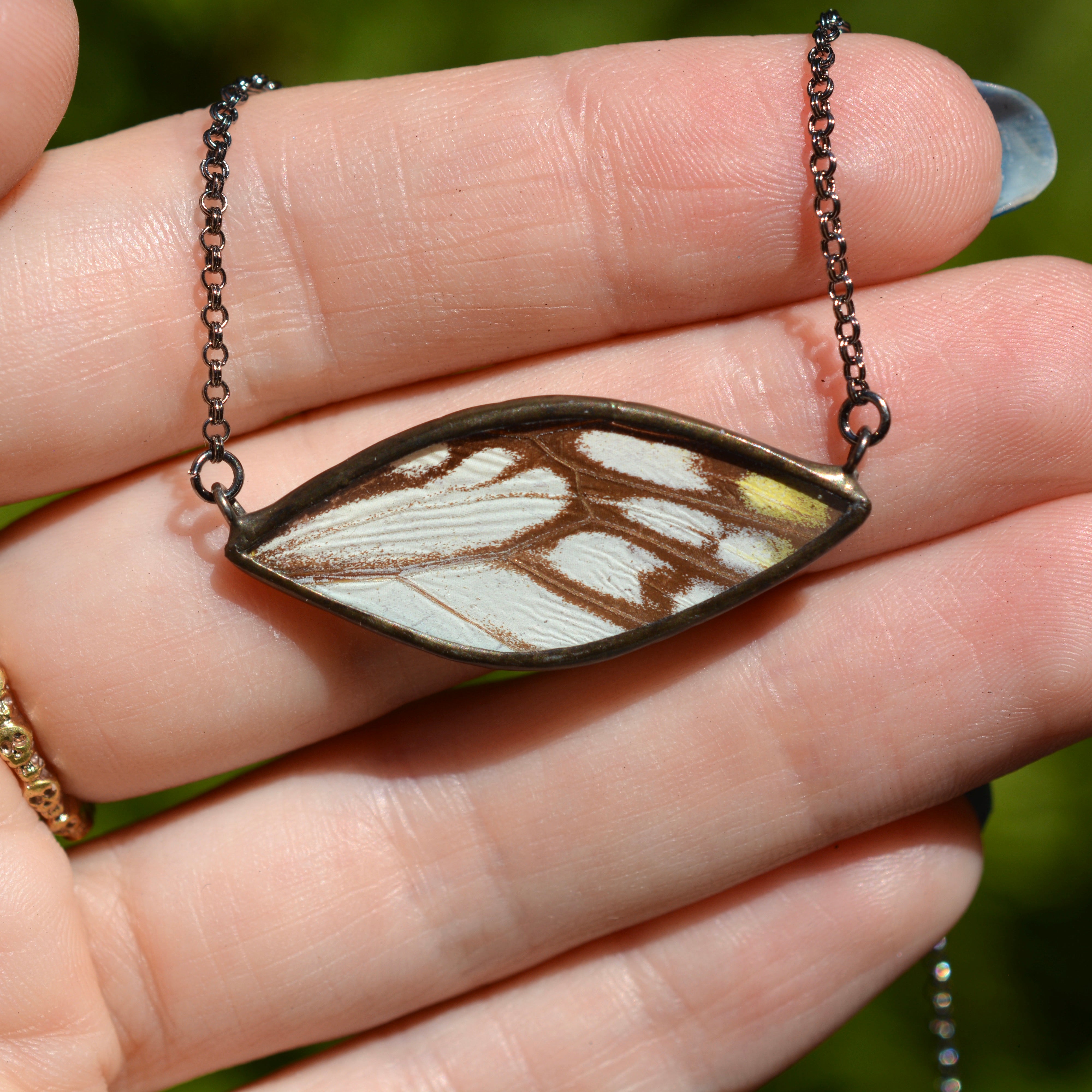 Black and White Butterfly Infinite Eye Necklace