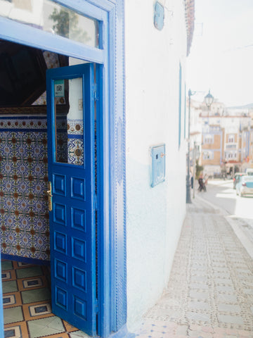 chefchaouen morocco blue city bright blue door city street
