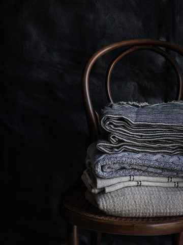 stack of linen throws