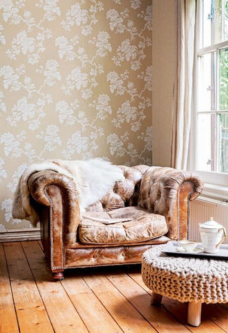 floral wallpaper with leather chair