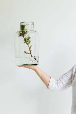 woman holding vase