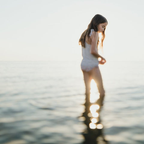 illuminate photography classes girl ocean swimsuit sunset