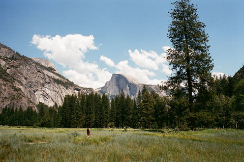 mom walking in front of half dome