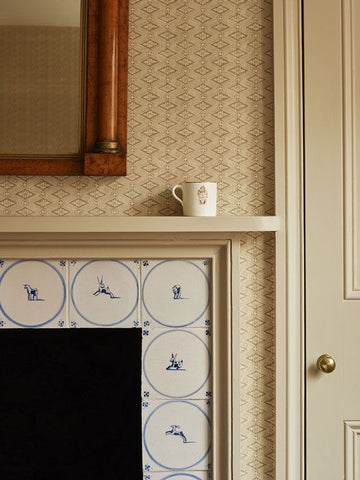patterns layered with tiled fireplace and wallpaper