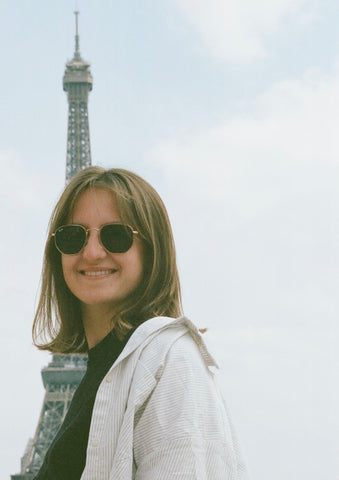 woman smiling with eiffel tower