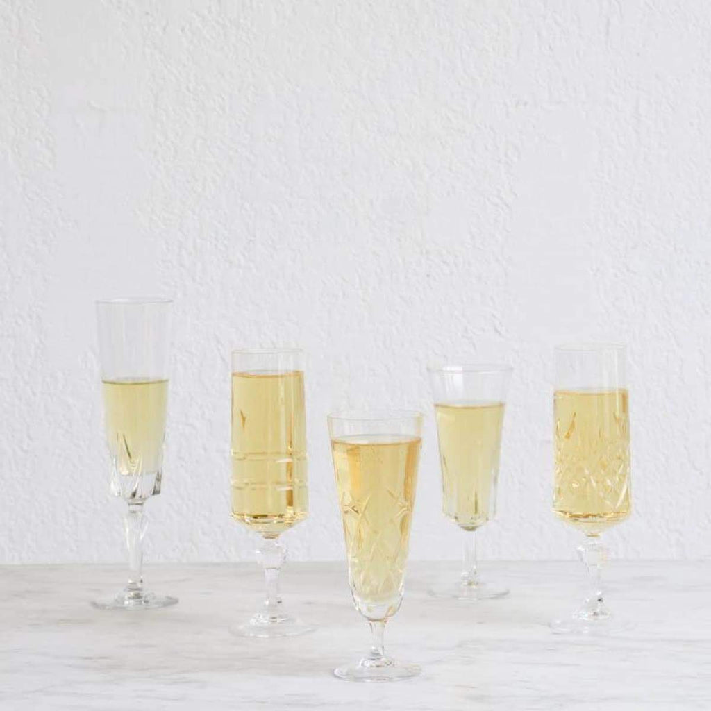 https://cdn.shopify.com/s/files/1/2336/3701/products/glamorous-vintage-flute-pair-the-french-kitchen-aperitif-appertif-glasses-champagne-coupe-coupes-glass-cocktail-yellow_433_1024x1024.jpg?v=1585670107