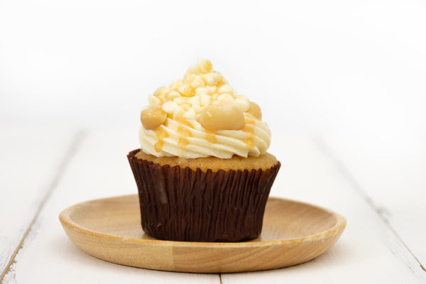 Frosted cupcake sitting on a plate