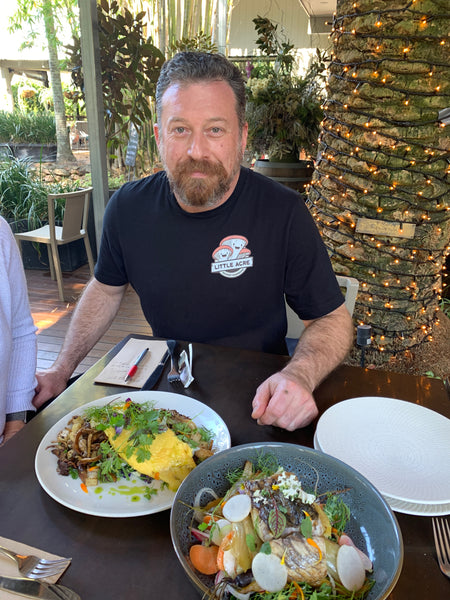 chef eating vegepod herbs from dish