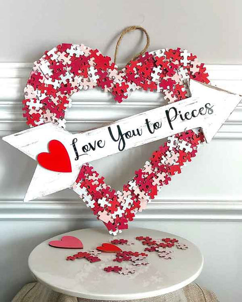 Craft image of "Love you to pieces" Valentines Day themed puzzle pieces arranged in heart shape