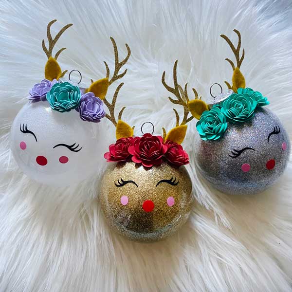 ornaments with reindeer antlers and die cut faces