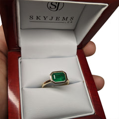 1.56ct Emerald in 18k Engagement Solitaire