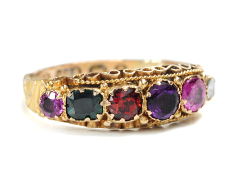 REGARD acrostic ring featuring a Ruby, Emerald, Garnet, Amethyst, a second Ruby and a Diamond