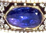 The Stuart Sapphire - Interestingly, there is a small drill hole on the left side of the gem, presumably placed there at some point for the purposes of mounting the stone as a pendant